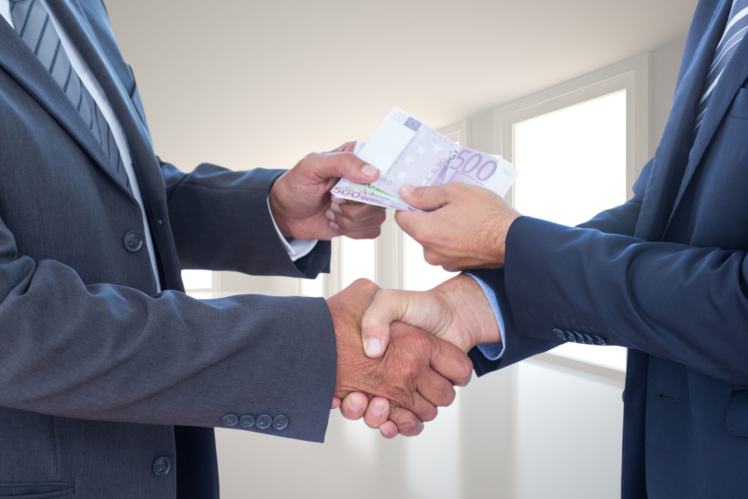 Businessmen With Bills Scaled